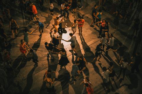 Large group of partners danding - Photo by Ardian Lumi on Unsplash