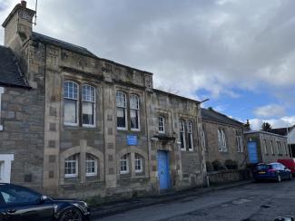 Dunning Hall front (looking west) with some parked vehicles