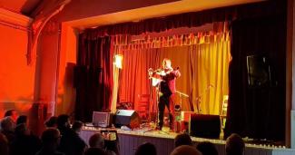 Tim Edey on stage during a concert at Dunning village hall